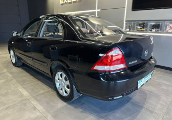 Подержанный автомобиль Nissan Almera Classic 2010 года (5 фото)