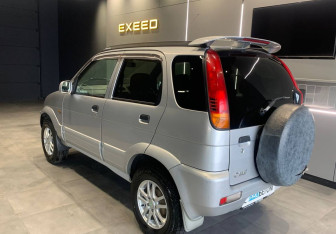 Подержанный автомобиль Toyota Cami 2000 года (5 фото)