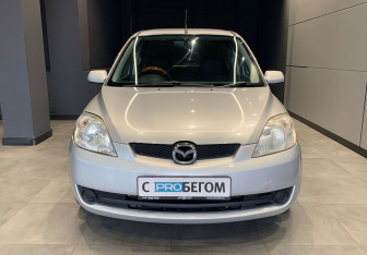 Подержанный автомобиль Mazda Demio 2006 года (3 фото)