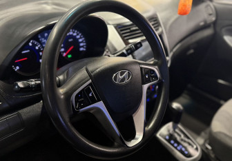 Подержанный автомобиль Hyundai Solaris Sedan 2013 года (10 фото)