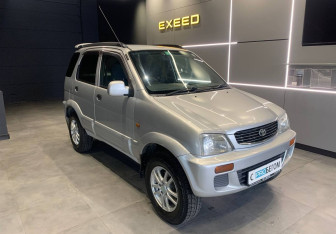 Подержанный автомобиль Toyota Cami 2000 года (2 фото)