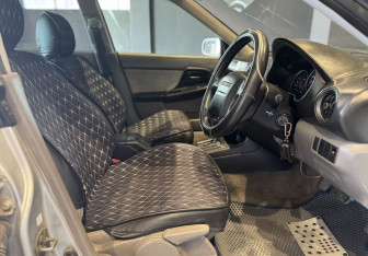 Подержанный автомобиль Subaru Impreza Wagon 2001 года (11 фото)