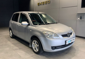 Подержанный автомобиль Mazda Demio 2006 года (2 фото)