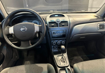 Подержанный автомобиль Nissan Almera Classic 2010 года (8 фото)