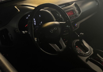 Подержанный автомобиль Kia Sportage 2015 года (8 фото)