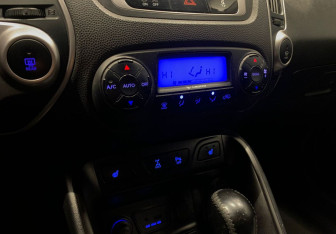 Подержанный автомобиль Hyundai ix35 2013 года (14 фото)