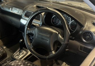 Подержанный автомобиль Subaru Impreza Wagon 2001 года (9 фото)