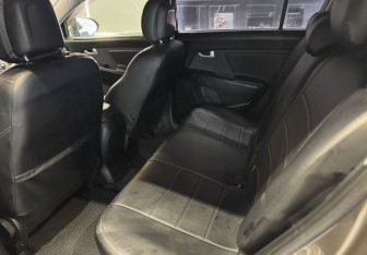 Подержанный автомобиль Kia Sportage 2010 года (15 фото)