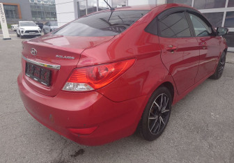 Подержанный автомобиль Hyundai Solaris Sedan 2013 года (7 фото)