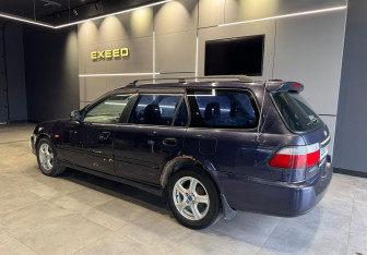 Подержанный автомобиль Honda Orthia 1996 года (11 фото)