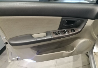 Подержанный автомобиль Kia Cerato Hatchback 2005 года (9 фото)