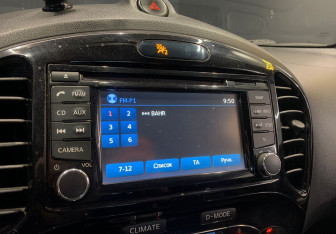 Подержанный автомобиль Nissan Juke 2014 года (10 фото)