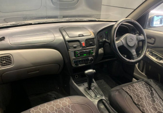 Подержанный автомобиль Nissan Sunny Sedan 2001 года (11 фото)