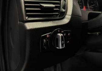 Подержанный автомобиль BMW X1 2014 года (11 фото)