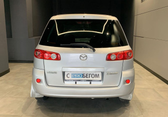 Подержанный автомобиль Mazda Demio 2006 года (6 фото)