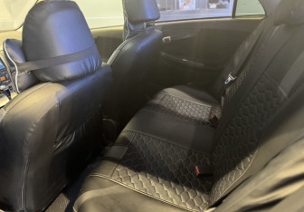 Подержанный автомобиль Toyota Corolla Sedan 2008 года (14 фото)