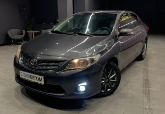 Подержанный автомобиль Toyota Corolla Sedan 2011 года (2 фото)