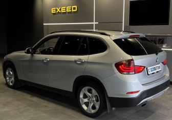 Подержанный автомобиль BMW X1 2014 года (7 фото)