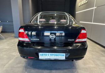 Подержанный автомобиль Nissan Almera Classic 2010 года (7 фото)