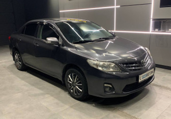 Подержанный автомобиль Toyota Corolla Sedan 2011 года (3 фото)