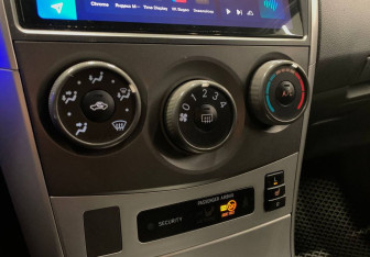 Подержанный автомобиль Toyota Corolla Sedan 2011 года (11 фото)