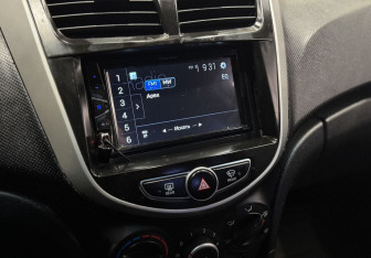Подержанный автомобиль Hyundai Solaris Sedan 2013 года (12 фото)