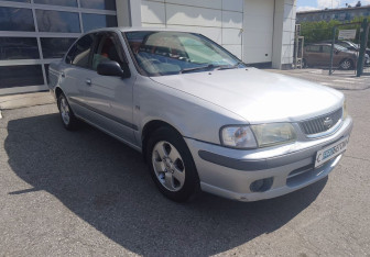 Подержанный автомобиль Nissan Sunny Sedan 2000 года (3 фото)
