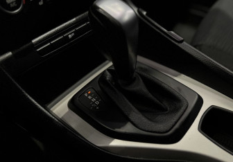 Подержанный автомобиль BMW X1 2014 года (12 фото)