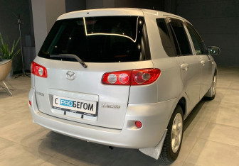 Подержанный автомобиль Mazda Demio 2006 года (5 фото)