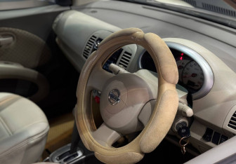 Подержанный автомобиль Nissan March Hatchback 2007 года (8 фото)