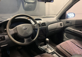 Подержанный автомобиль Nissan Almera Classic 2006 года (8 фото)