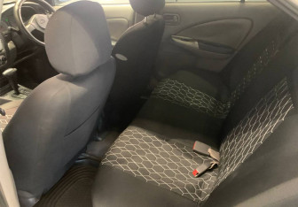 Подержанный автомобиль Nissan Sunny Sedan 2001 года (9 фото)