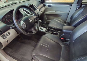 Подержанный автомобиль Mitsubishi Pajero Sport 2013 года (24 фото)