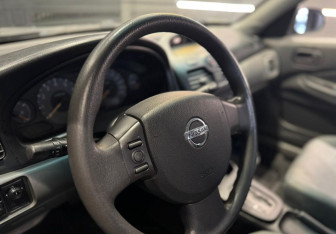 Подержанный автомобиль Nissan Almera Classic 2011 года (9 фото)