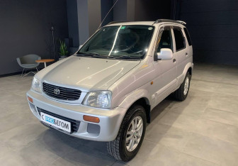 Подержанный автомобиль Toyota Cami 2000 года (4 фото)