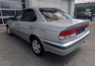 Подержанный автомобиль Nissan Sunny Sedan 2000 года (6 фото)