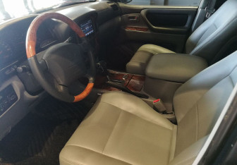 Подержанный автомобиль Toyota Land Cruiser Suv 1998 года (13 фото)