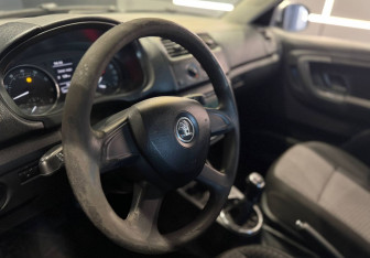 Подержанный автомобиль Skoda Fabia Wagon 2013 года (8 фото)