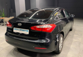 Подержанный автомобиль Kia Cerato Sedan 2013 года (6 фото)