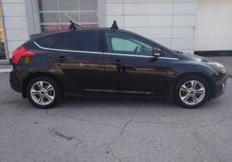 Подержанный автомобиль Ford Focus Hatchback 2011 года (7 фото)
