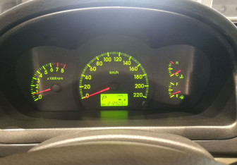 Подержанный автомобиль Kia Cerato Hatchback 2005 года (7 фото)