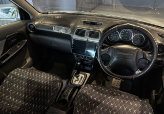 Подержанный автомобиль Subaru Impreza Wagon 2001 года (8 фото)