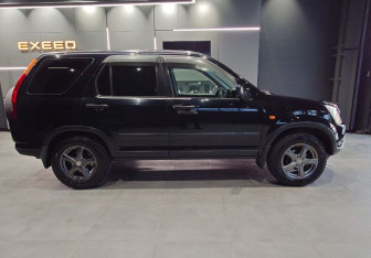 Подержанный автомобиль Honda CR-V 2002 года (7 фото)