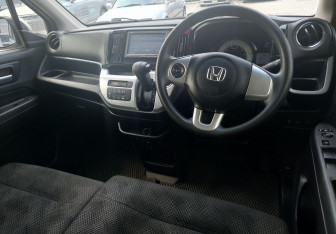 Подержанный автомобиль Honda N-WGN 2019 года (13 фото)