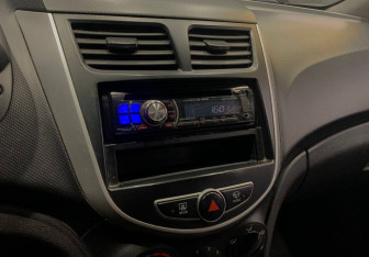 Подержанный автомобиль Hyundai Solaris Sedan 2011 года (13 фото)