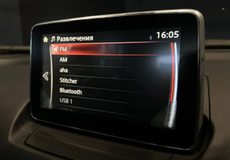 Подержанный автомобиль Mazda CX-3 2015 года (10 фото)