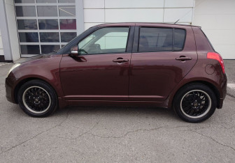 Подержанный автомобиль Suzuki Swift Hatchback 2010 года (6 фото)