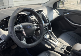 Подержанный автомобиль Ford Focus Sedan 2014 года (7 фото)