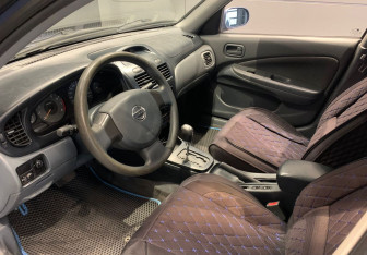 Подержанный автомобиль Nissan Almera Classic 2006 года (14 фото)